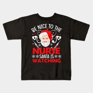 be nice to the nurse santa is watching Kids T-Shirt